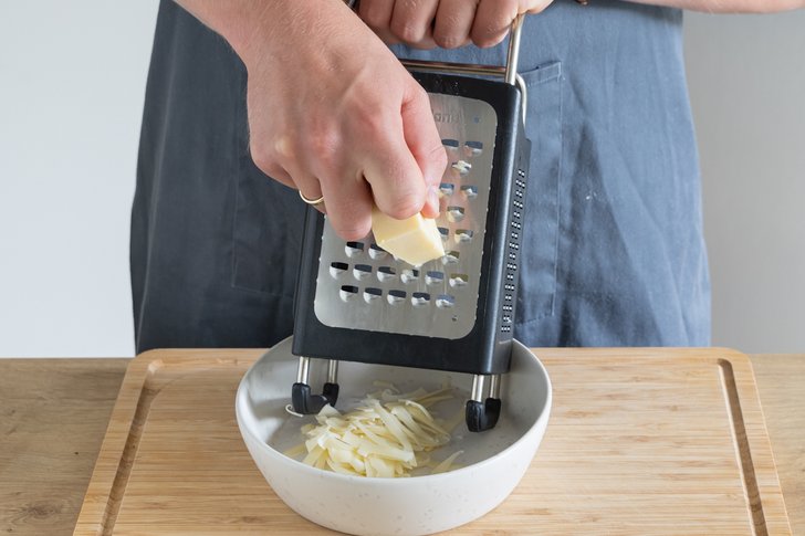 Käse reiben