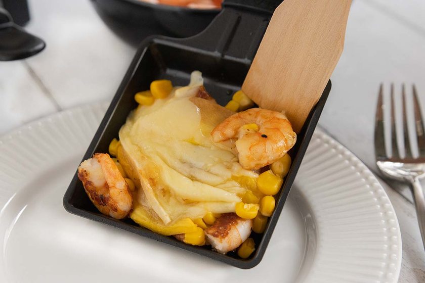 Raclette mit Garnelen und Mango
