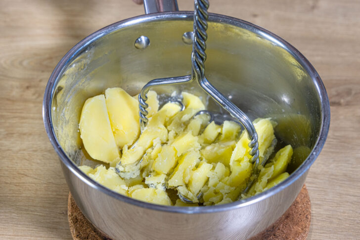 Kartoffeln zerdrücken