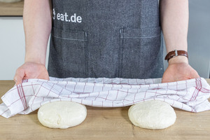 Pizzateig abdecken