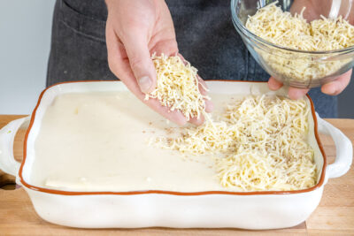Käse-Sesam Mix darüberstreuen