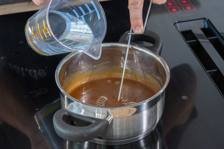 mit Wasser verdünnen