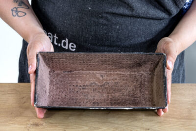 Kastenform ausstäuben