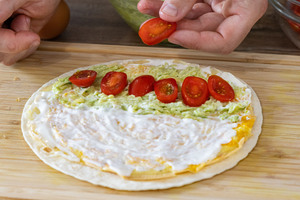 Tomaten darauflegen