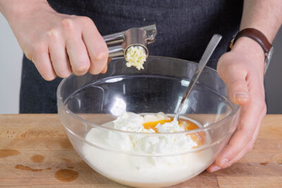 Knoblauch pressen