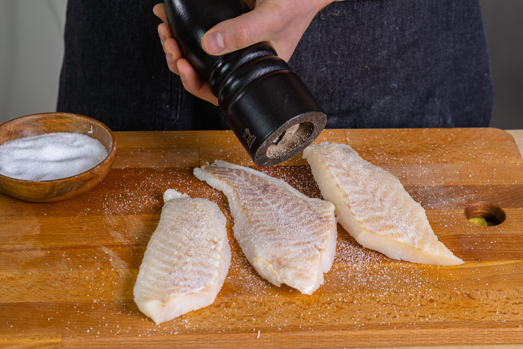 Fischfilets würzen