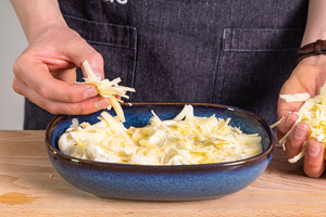 Käse darüber streuen