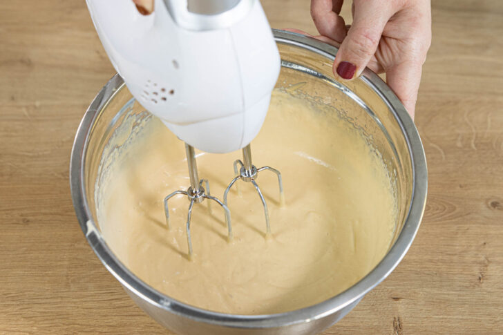 Buttercreme erhitzen und erneut aufschlagen