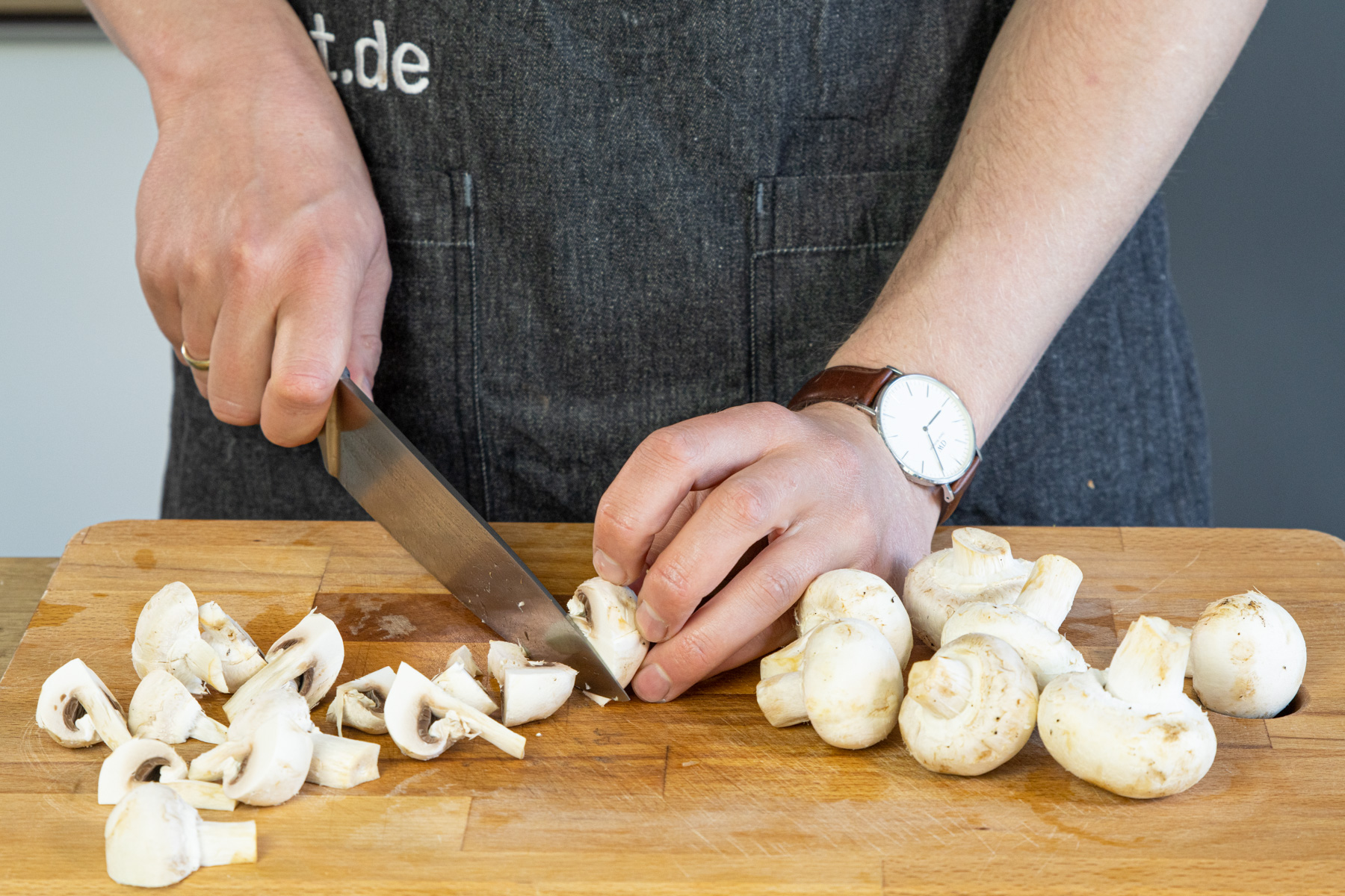Champignons vierteln