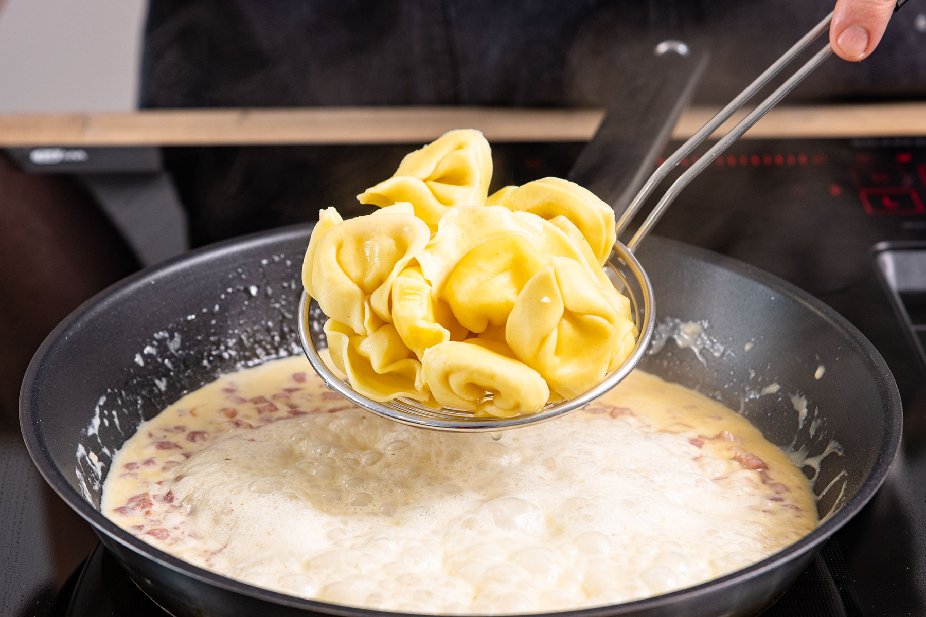 Tortellini dazugeben