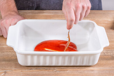 Tomatensauce verteilen