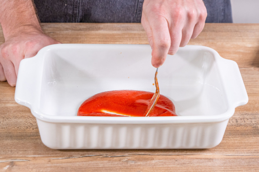 Tomatensauce verteilen