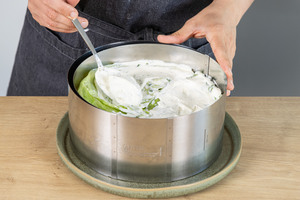 mit Creme bestreichen