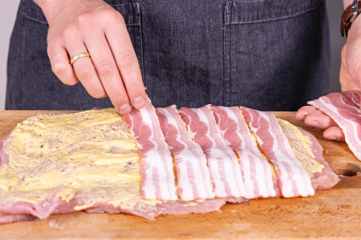 mit Bacon belegen