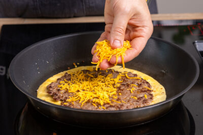 Cheddar auf Big Mac Taco geben