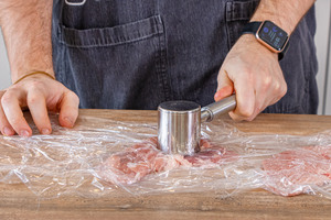 Schweinefleisch klopfen