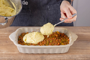 Kartoffelpüree darüber geben