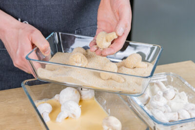 Champignons panieren