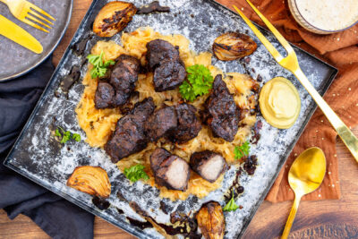 Mutzbraten aus dem Backofen mit Sauerkraut