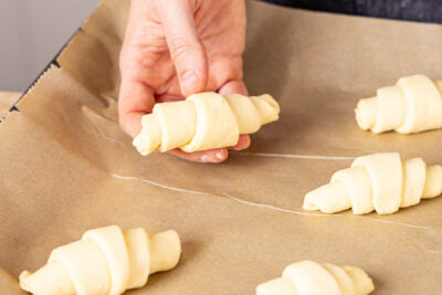 Teiglinge auf ein Backblech mit Backpaier geben