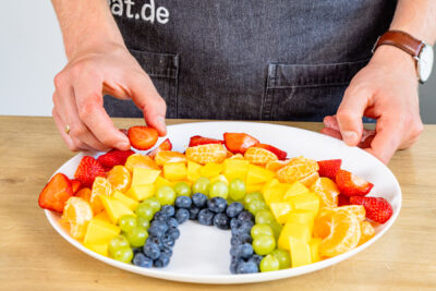 Erdbeeren als letzten Bogen anordnen