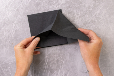 Papierserviettenfaltung öffnen