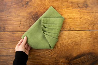 Linke Serviettenspitze