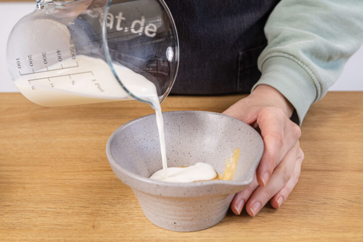 Milch dazugeben