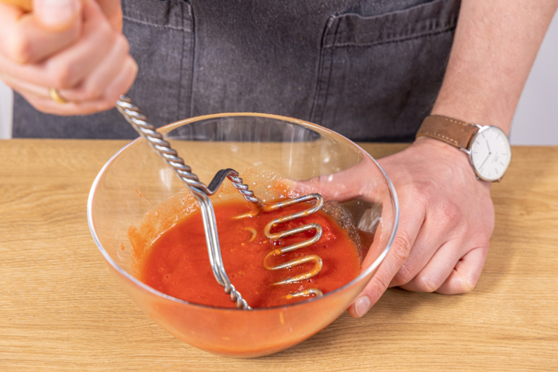 Dosentomaten zerstampfen