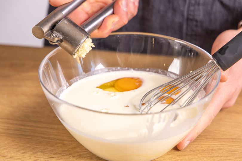 Knoblauch pressen