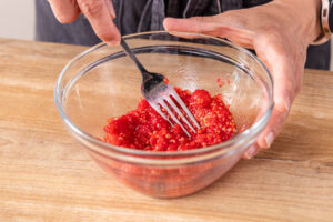 Himbeeren zerquetschen
