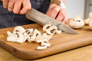 Champignons schneiden
